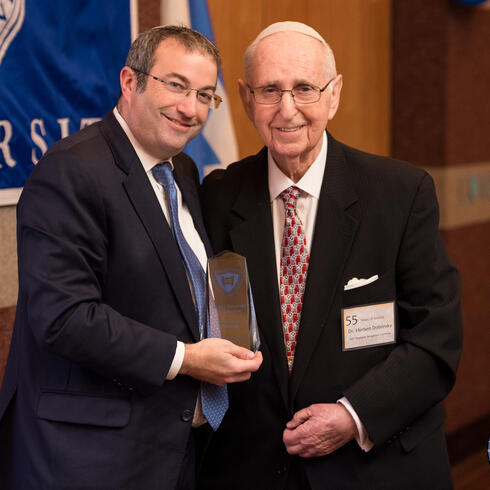 Rabbi Dr. Ari Berman, president of Yeshiva University, (left) and Dr. Herbert Dobrinksy